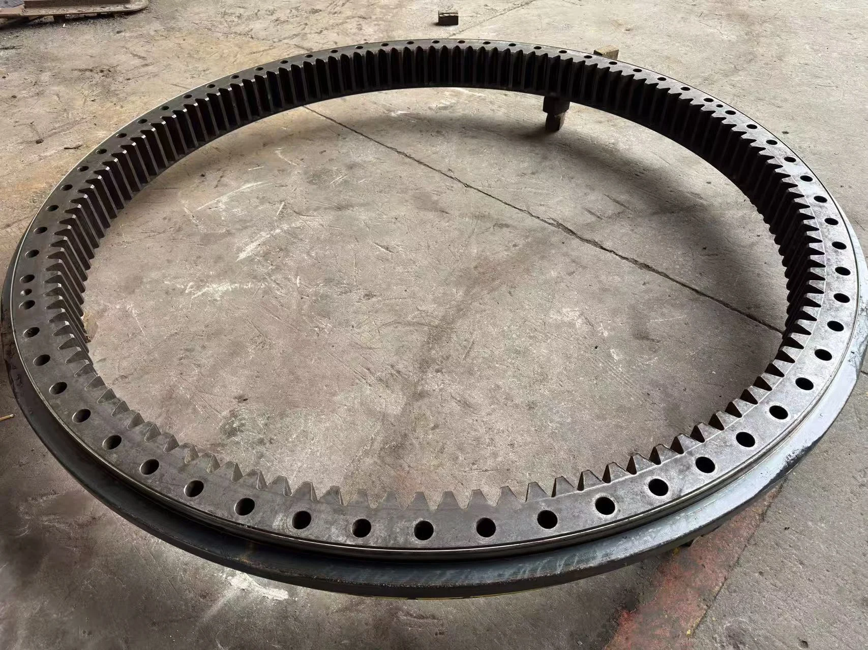 Internal-gear bearing ring after disassembly and cleaning for inspection.
