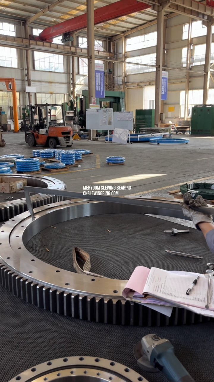 Check the center distance of the mounting holes of the slewing bearing