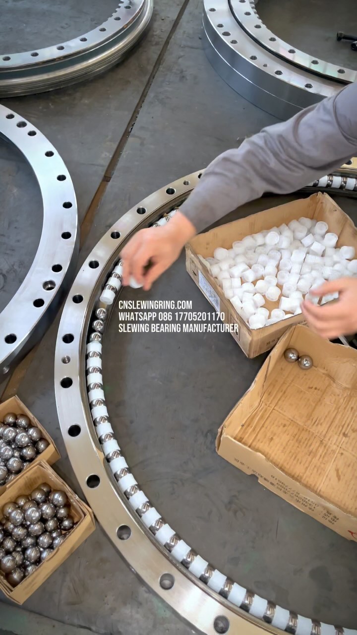 Silver metal balls, black metal raceways, mixed with golden grease. Yeah, we love life and these big guys!