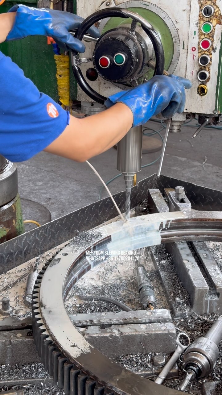 Machining of mounting holes on the outer ring of the slewing bearing.