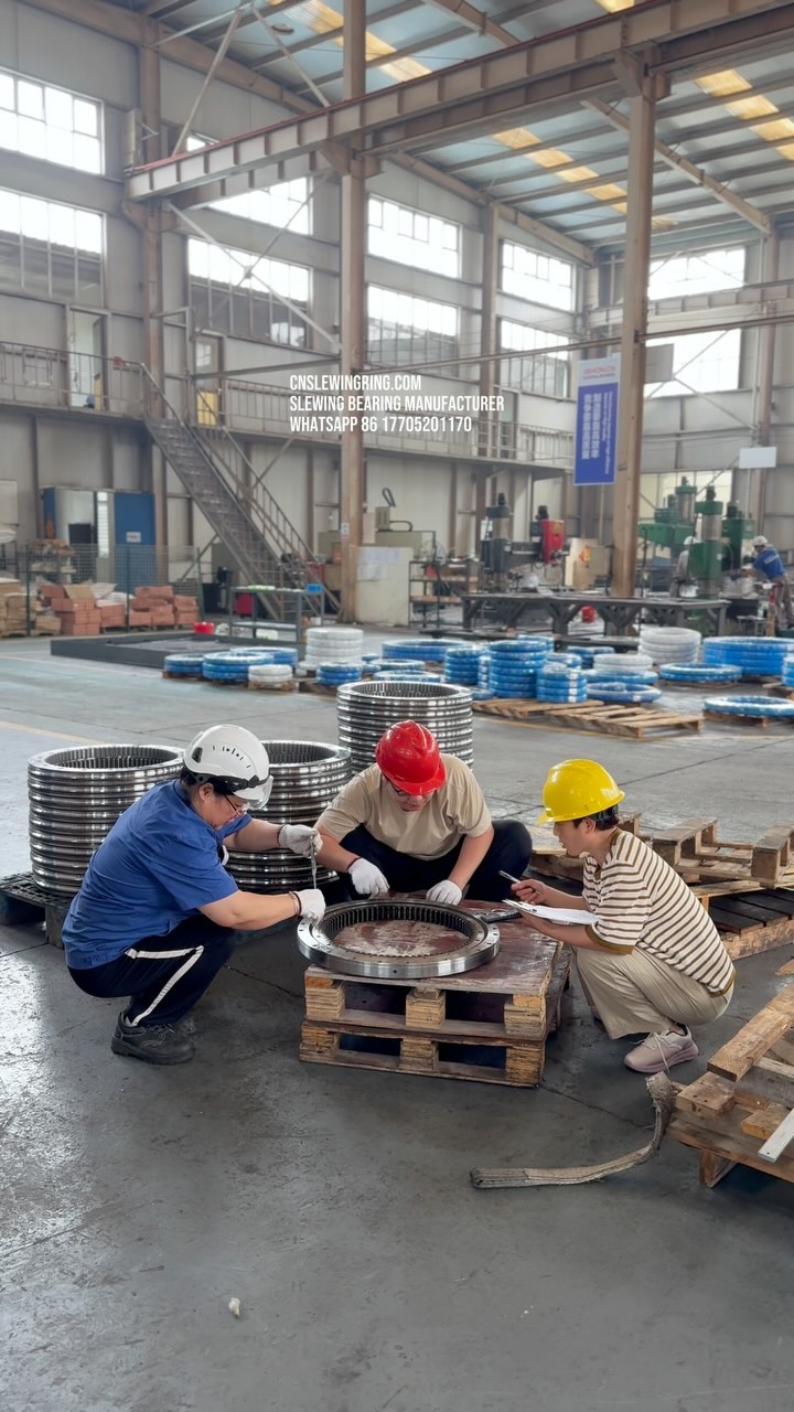 The customer shipped the slewing bearing from the United States to our factory. We are measuring the slewing…