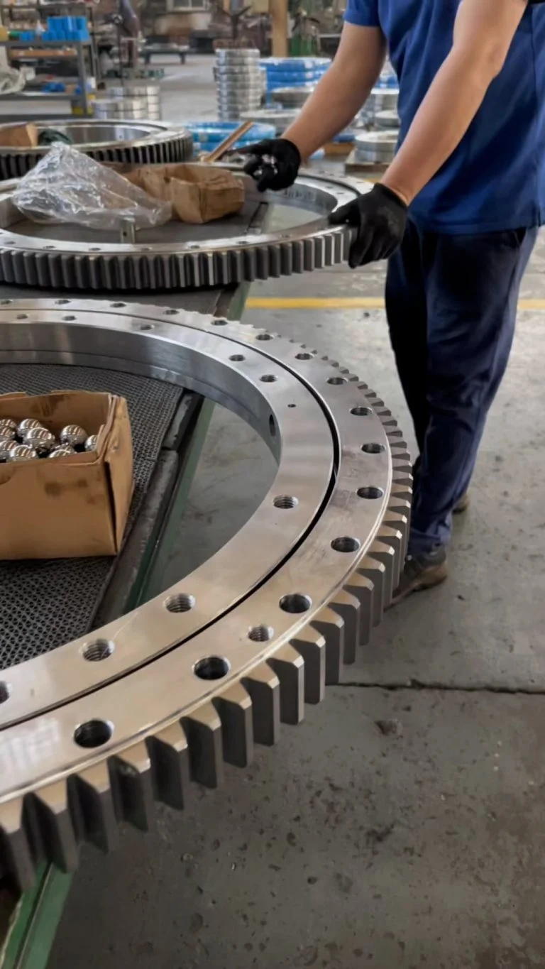 Quickly place the steel ball into the slewing bearing raceway, and then perform a clearance test to confirm…